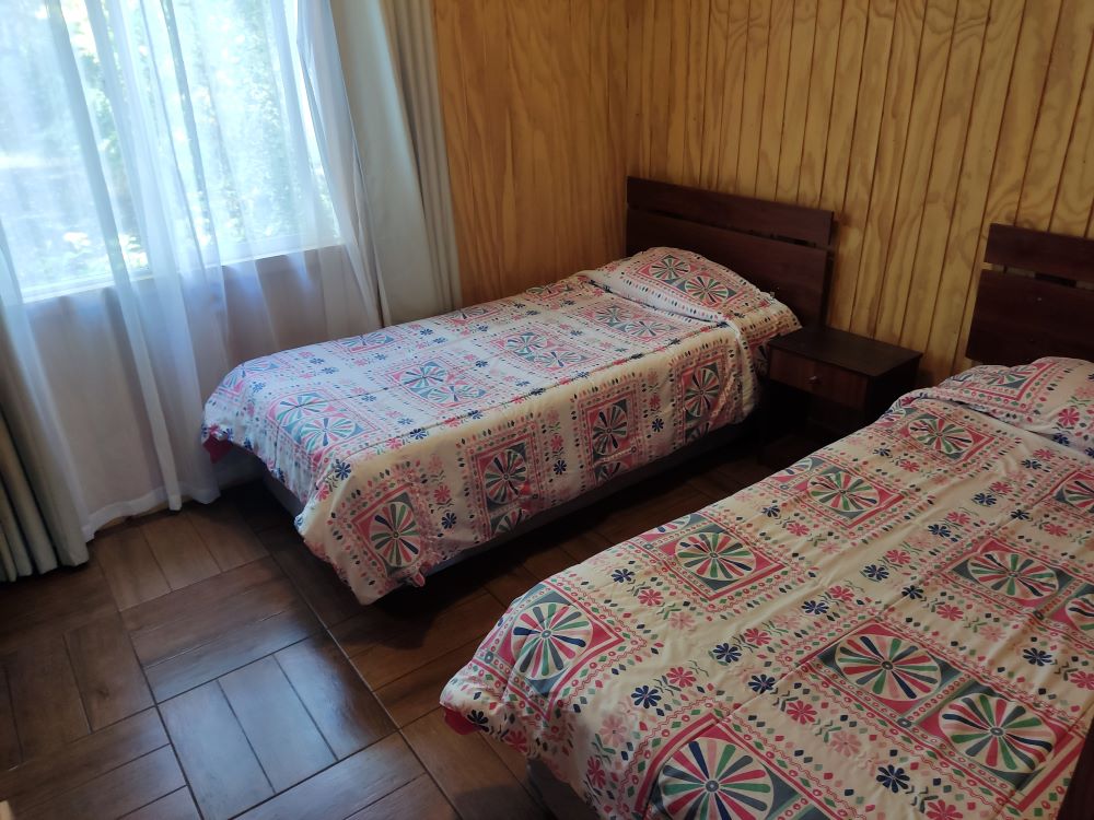 Pieza de la cabaña El Peumo de Cabañas El Molino Suyay