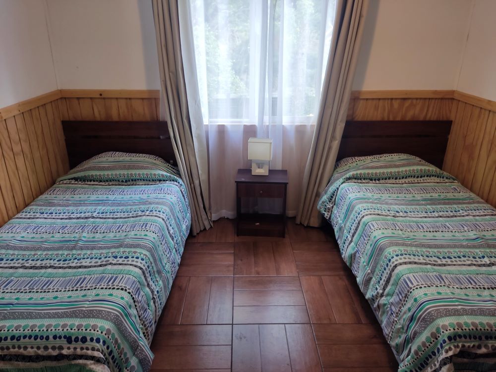 Pieza de la cabaña El Peumo de Cabañas El Molino Suyay