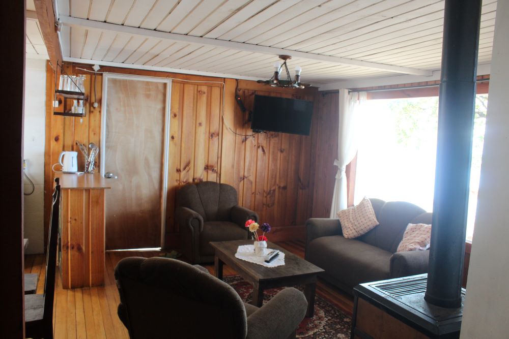 Comedor de la cabaña La Quila de Cabañas El Molino Suyay